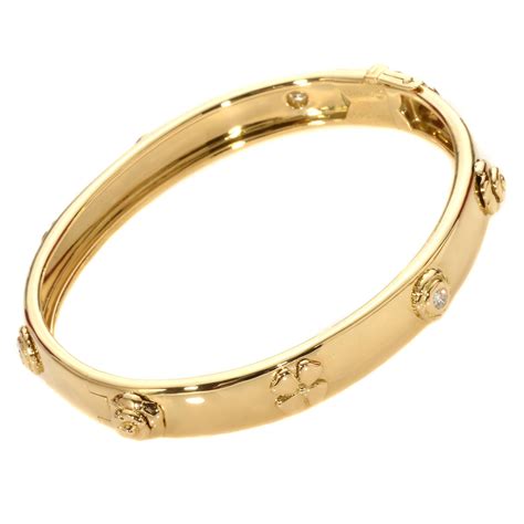 chanel silver bangle|Chanel gold bracelet with diamonds.